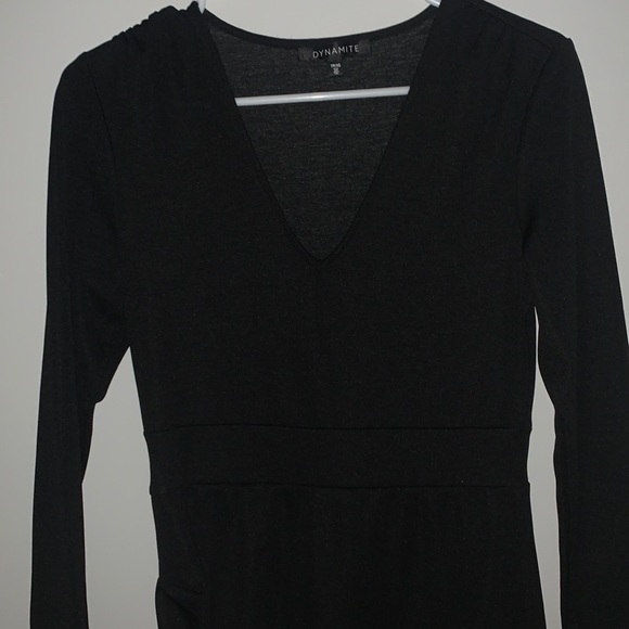 A black tight dress. - Picture 2 of 3